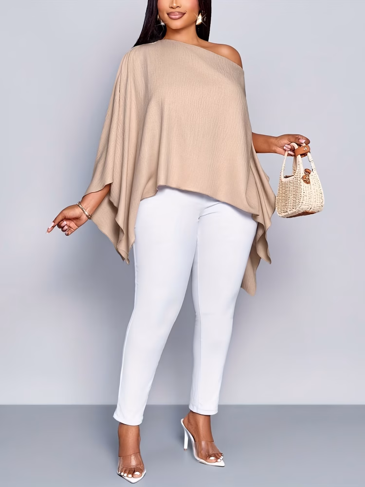 Fashionable Plus Size One‑Shoulder Blouse Featuring Cape Sleeve Detail and Asymmetrical Hemline