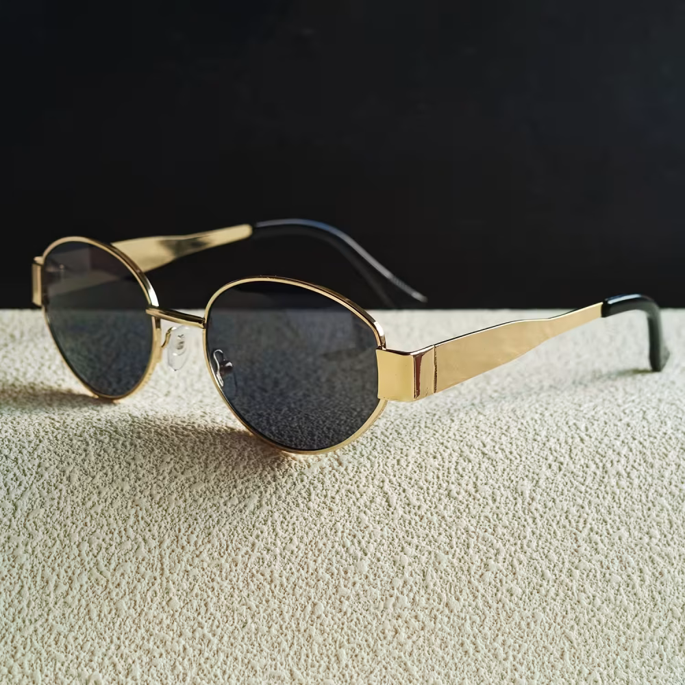 A Pair of Elegant Women Glasses with a Golden Rim – Oval Frame, Metal Hinges, Suitable for Both Casual And Formal Occasions – a Refined Accessory for Parties And Offices, Featuring a Trendy Design, Durable Materials, And a Chic Style